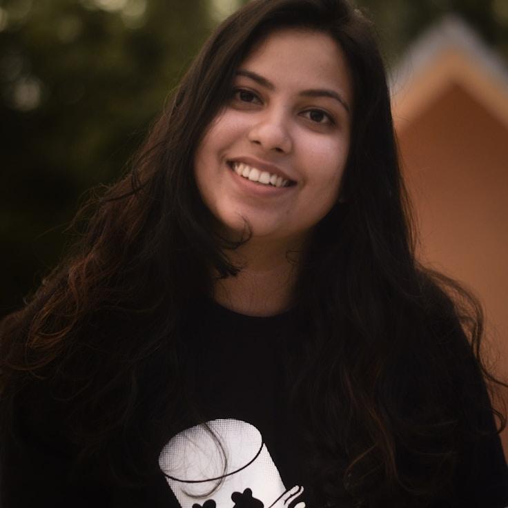 Portrait of Nova, group coordinator and fusion cooking expert